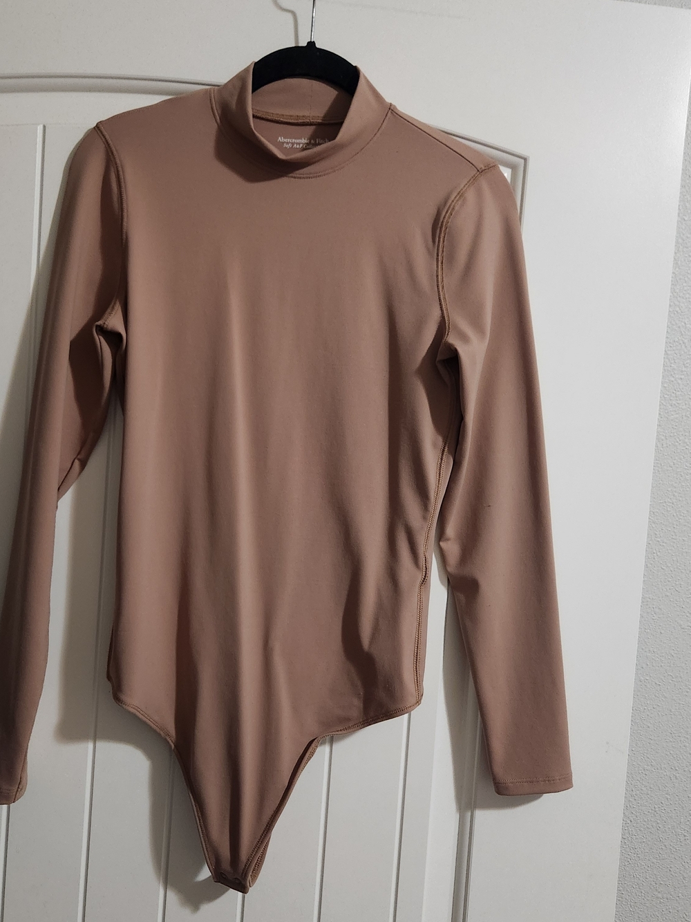 Abercrombie & Fitch Long-Sleeve One-Piece Bodysuit in Nude